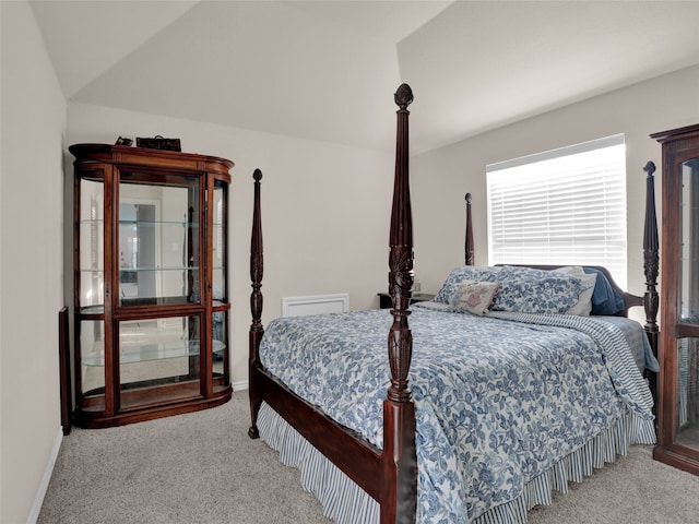 bedroom with light colored carpet