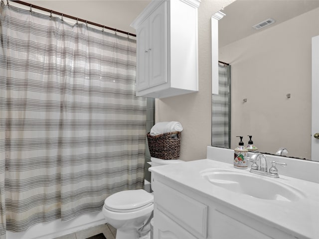 full bathroom featuring vanity, tile patterned floors, toilet, and shower / bath combo