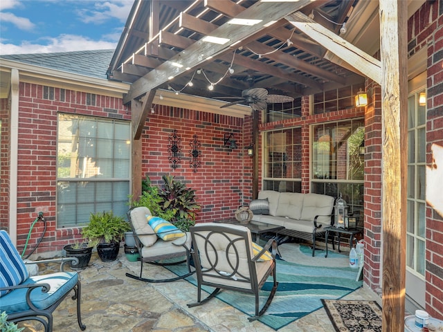 view of patio featuring an outdoor living space and ceiling fan