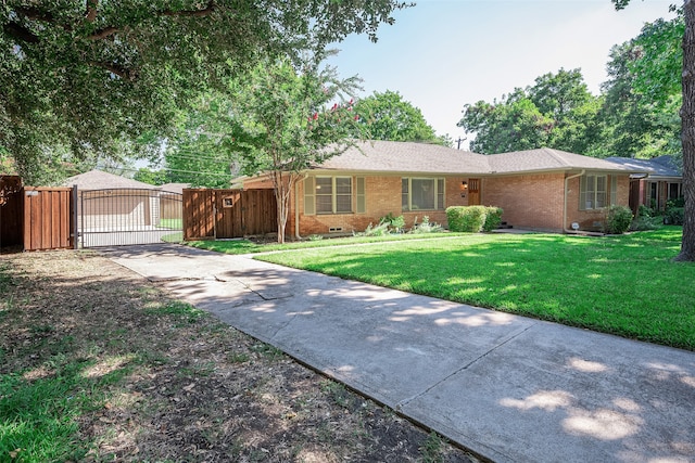 single story home with a front yard