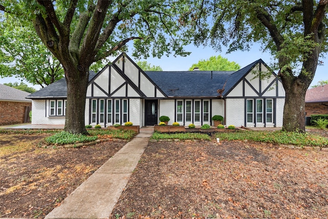 view of tudor-style house