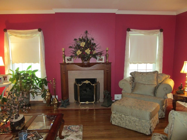 401 Craig St, Hillsboro, TX 76645 - living area with ornamental molding, wood finished floors, and a fireplace