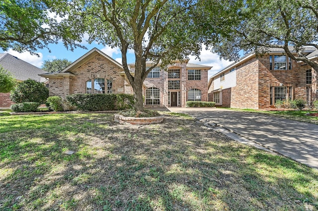 view of front of home with a front lawn