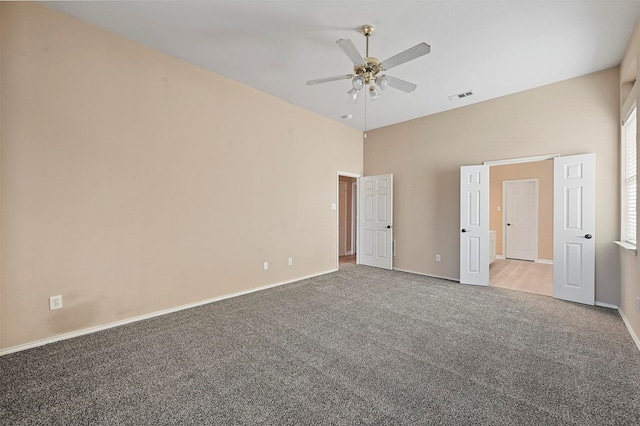 unfurnished bedroom with ceiling fan and carpet floors