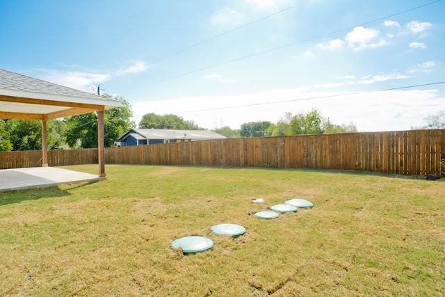 view of yard with a patio area