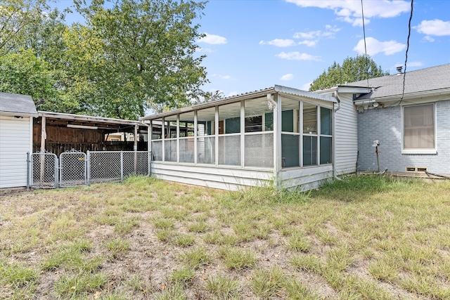 back of house with a yard