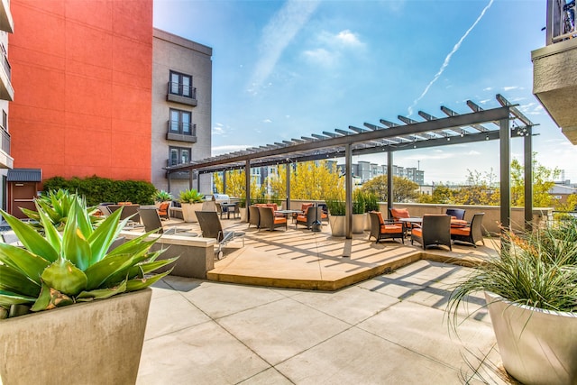 view of patio with a pergola and an outdoor hangout area