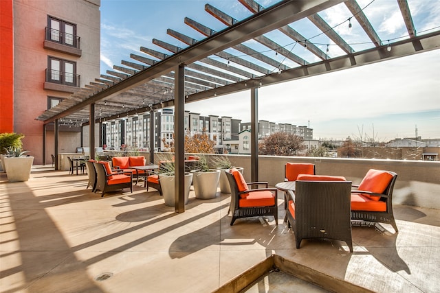 view of patio with a pergola and an outdoor living space