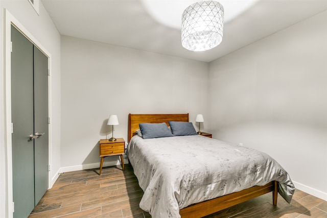 bedroom featuring hardwood / wood-style flooring