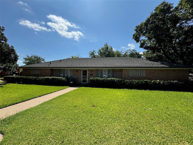 ranch-style house with a front yard