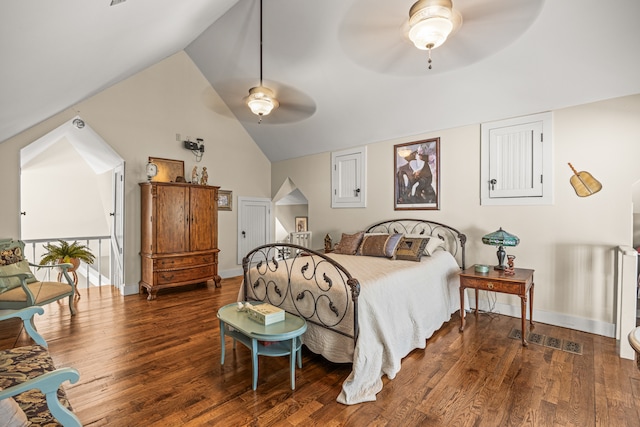 bedroom featuring ceiling fan, lofted ceiling, and hardwood / wood-style floors