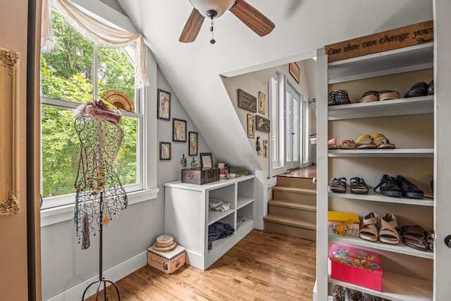 interior space with vaulted ceiling, light hardwood / wood-style floors, and ceiling fan