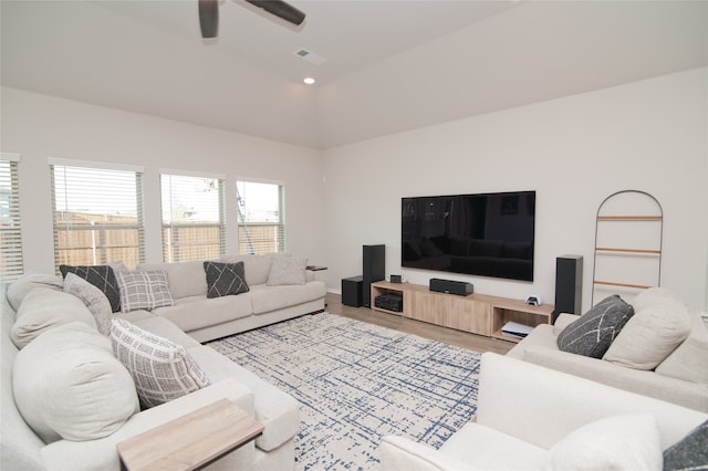 living room with ceiling fan and hardwood / wood-style floors