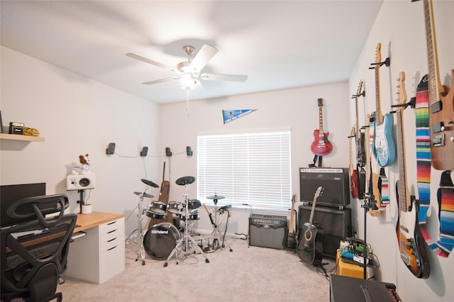 office space featuring ceiling fan and light colored carpet