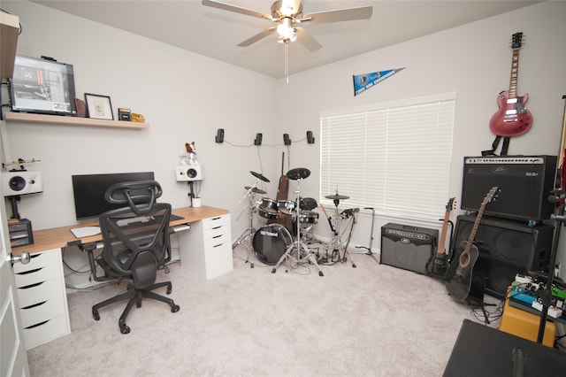 office space featuring ceiling fan and light colored carpet