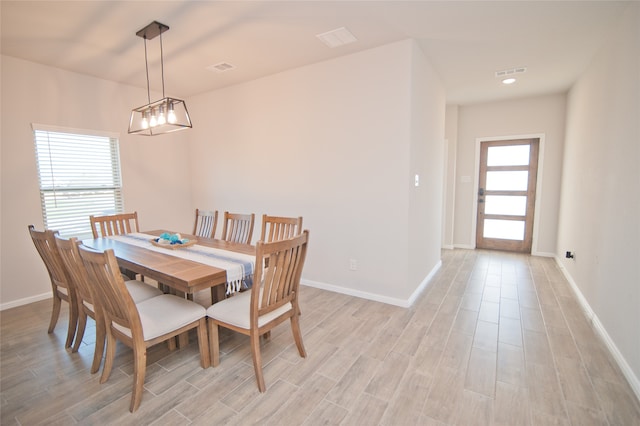 dining space featuring light hardwood / wood-style flooring