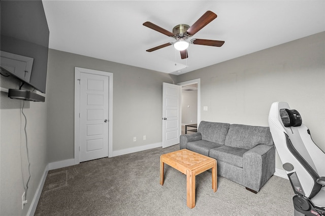 living room with carpet flooring and ceiling fan