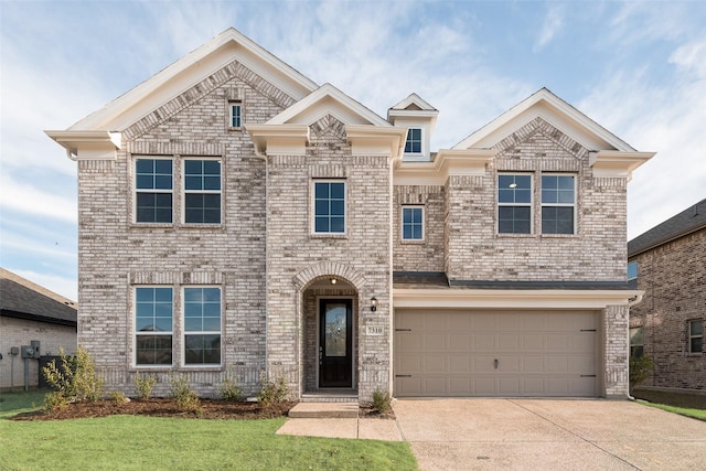 view of front facade featuring driveway, a garage, a front lawn, and brick siding