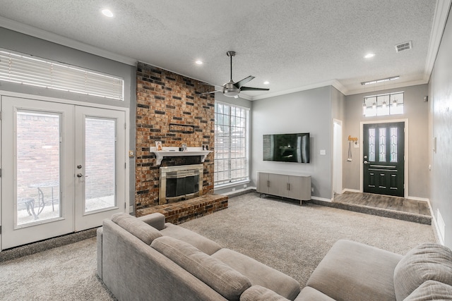 living room with a textured ceiling and carpet flooring