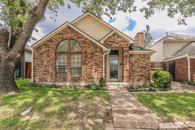 205 Benwynd Dr, Mesquite, TX 75149 - view of front of property featuring a chimney and brick siding