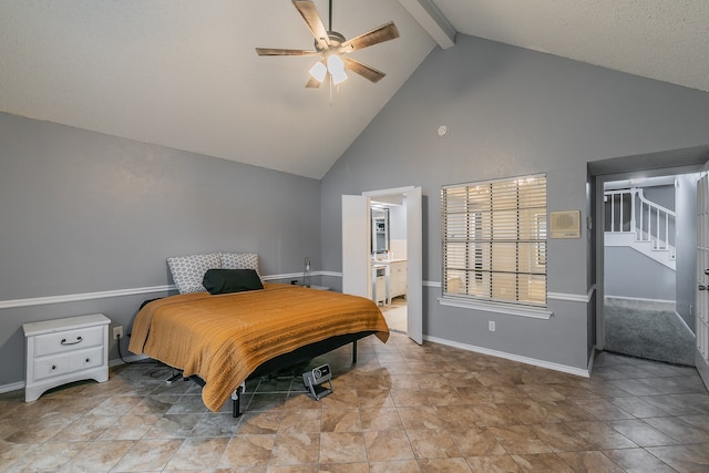 bedroom with ensuite bathroom, high vaulted ceiling, ceiling fan, and beam ceiling