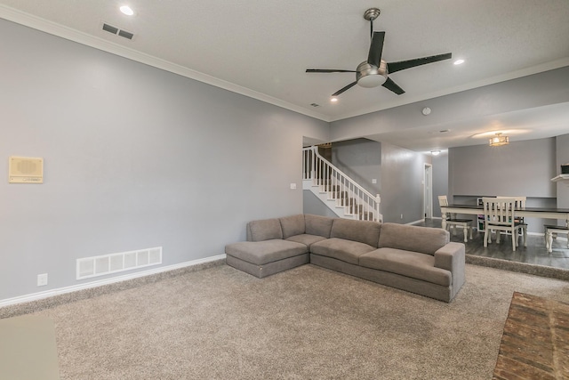 205 Benwynd Dr, Mesquite, TX 75149 - carpeted living area featuring stairway, a ceiling fan, recessed lighting, and ornamental molding