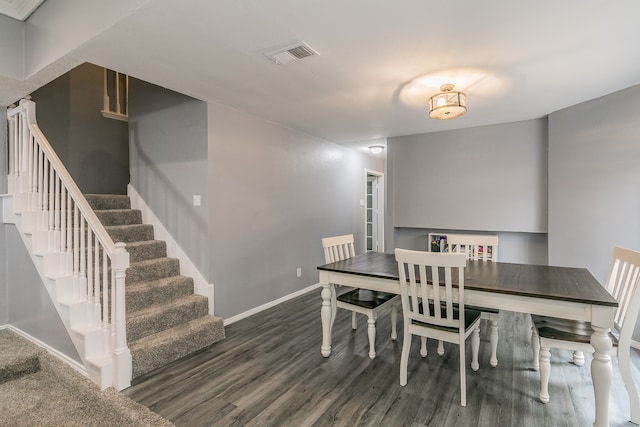 dining room featuring dark hardwood / wood-style floors