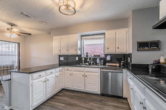 205 Benwynd Dr, Mesquite, TX 75149 - kitchen featuring dishwasher, a peninsula, ceiling fan, white cabinets, and dark countertops