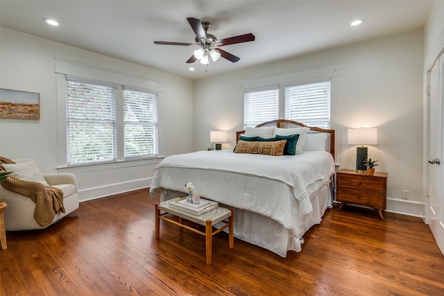 bedroom featuring ceiling fan and dark hardwood / wood-style flooring