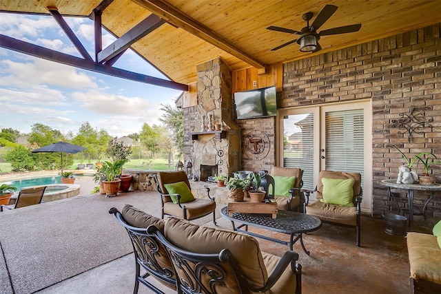 view of patio / terrace with an outdoor hangout area, a swimming pool with hot tub, and ceiling fan