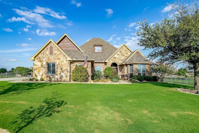 view of front of home with a front yard