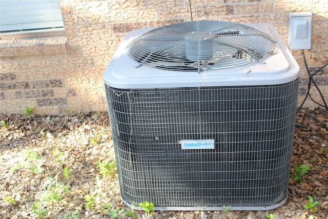 exterior details featuring cooling unit