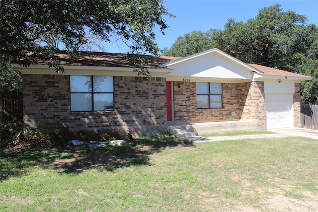 single story home with a front lawn