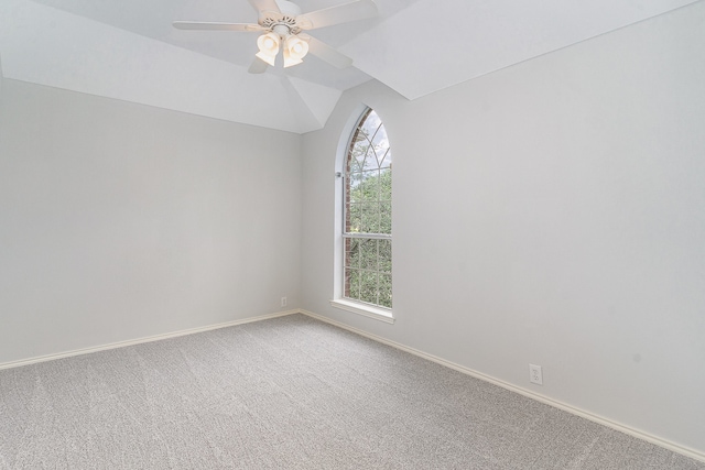 unfurnished room featuring carpet flooring, ceiling fan, and lofted ceiling