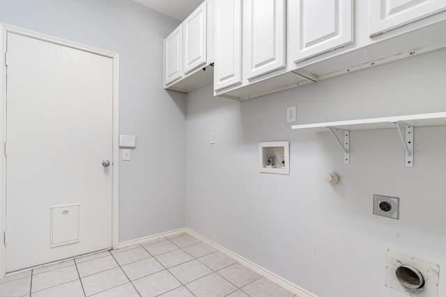 laundry room featuring cabinets, washer hookup, hookup for an electric dryer, hookup for a gas dryer, and light tile patterned flooring