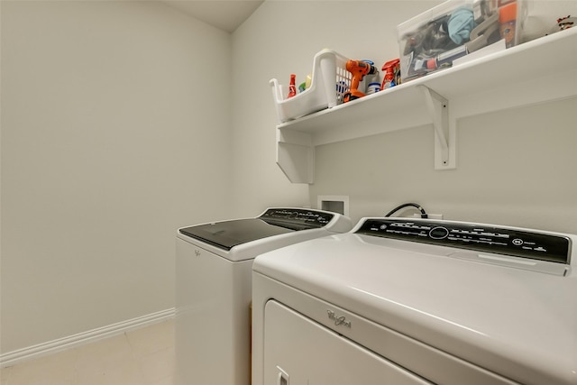 laundry room with washer and clothes dryer