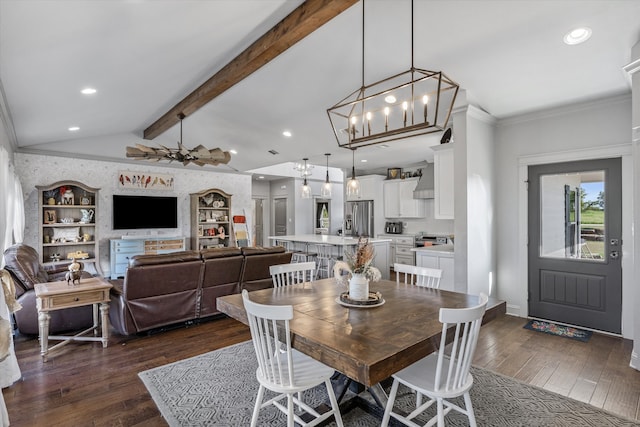 dining room with dark hardwood / wood-style floors, a chandelier, lofted ceiling with beams, and ornamental molding