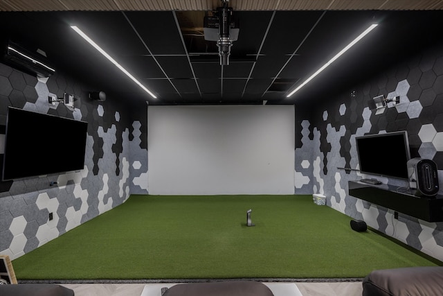 game room featuring golf simulator and carpet