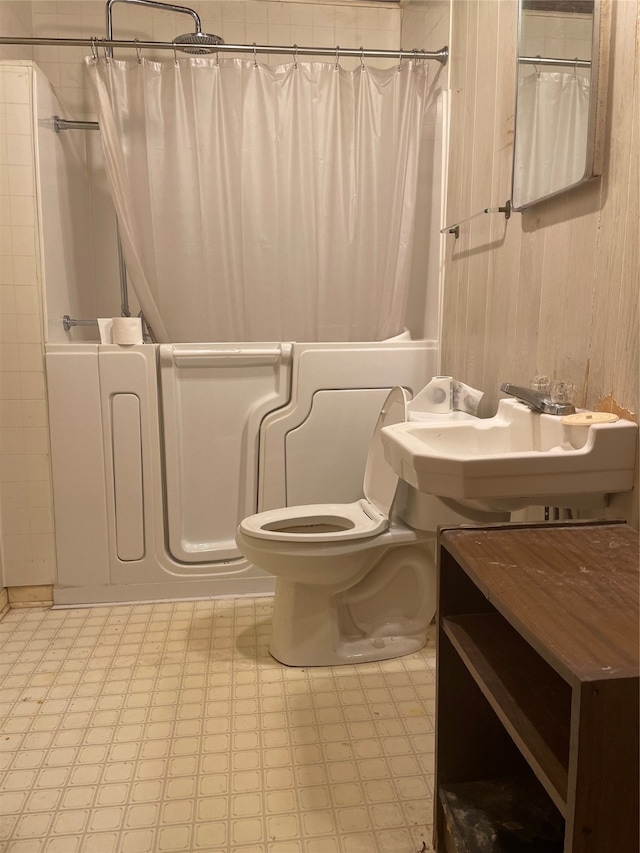 bathroom featuring sink and toilet