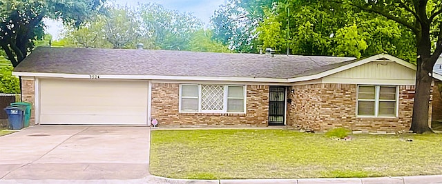 ranch-style house with a front lawn and a garage