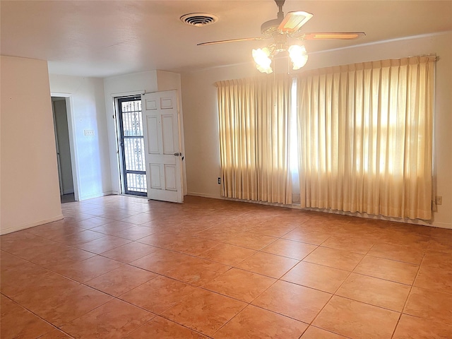 3504 Westfield Ave, Fort Worth, TX 76133 - spare room with a ceiling fan, light tile patterned flooring, and baseboards