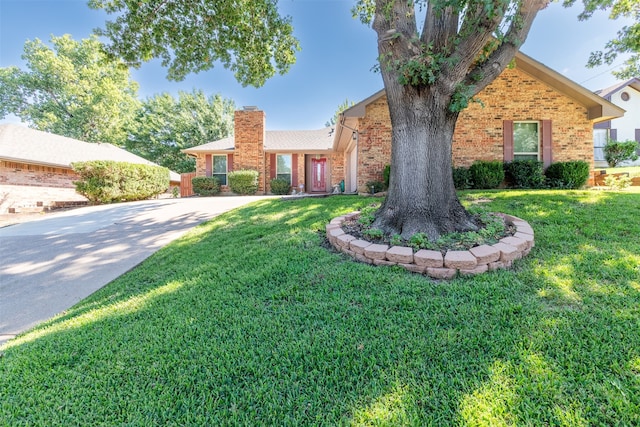 view of front of home with a front yard