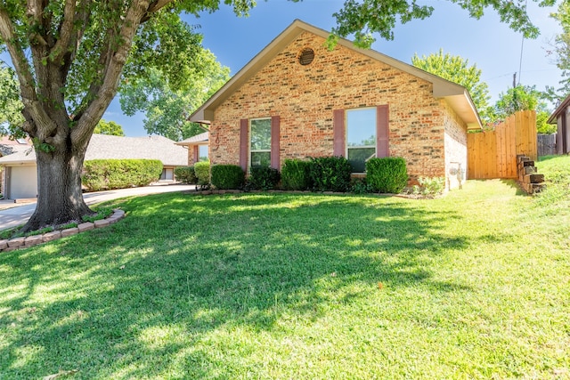 front facade featuring a front lawn