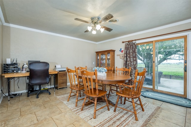 dining space with crown molding and ceiling fan