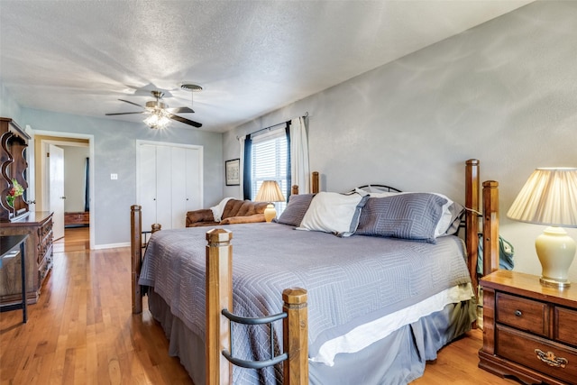 3396 County Road 302, Muenster, TX 76252 - bedroom with visible vents, a ceiling fan, a closet, and wood finished floors