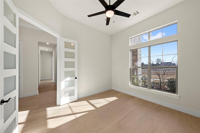 interior space featuring ceiling fan and light wood-type flooring