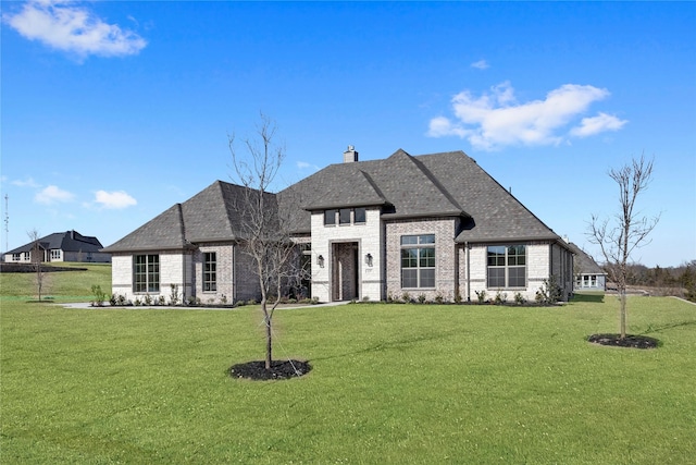 view of front facade with a front lawn