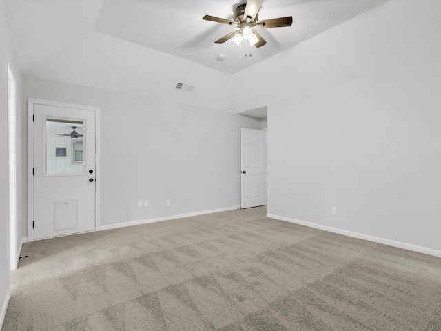 carpeted empty room featuring ceiling fan