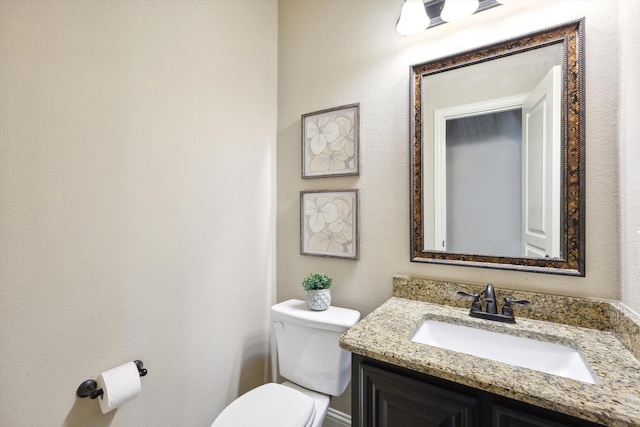 1104 Dove Haven Dr, Mansfield, TX 76063 - half bathroom featuring toilet and vanity