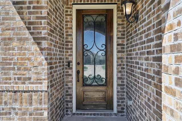1104 Dove Haven Dr, Mansfield, TX 76063 - view of exterior entry featuring brick siding